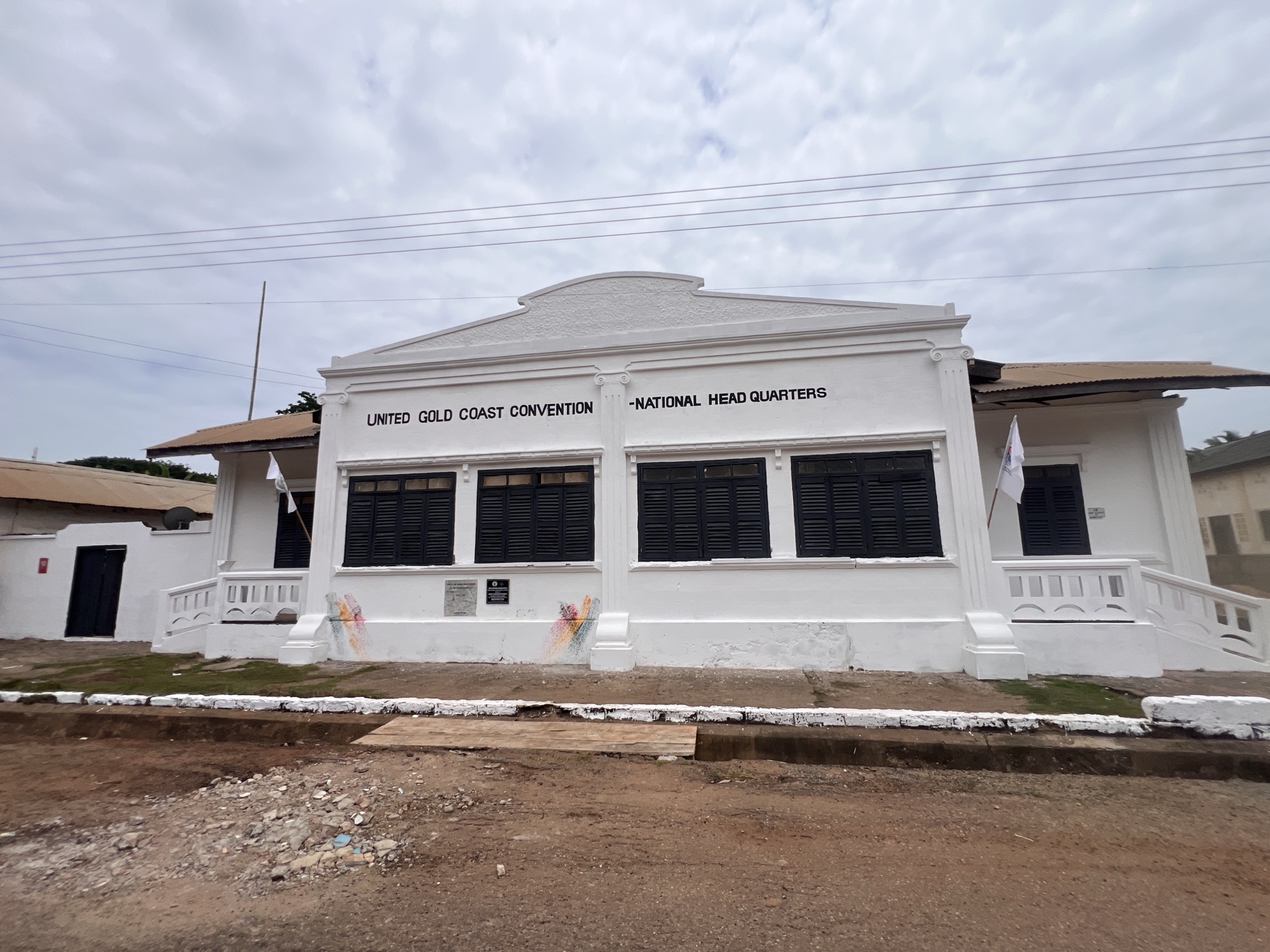 white house with inscription united gold coast convention- national headquarters