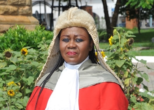 a woman dressed as a judge